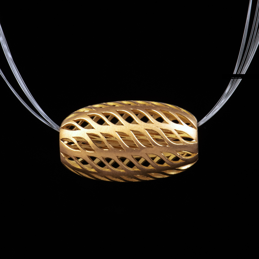 Ausgefallene Halskette von Matthias Grosche - handgefertigte Schmuckkunst aus 750/-Gelbgold an Nylon aus dem Galeriehaus Grosche, Castrop-Rauxel im Ruhrgebiet bei Bochum.