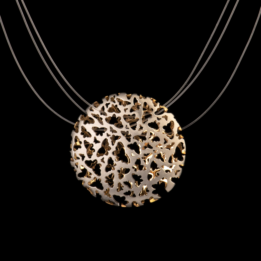 Ausgefallene Halskette von Matthias Grosche - handgefertigte Schmuckkunst aus 750/-Gelbgold und 950/- Platin an Nylon aus dem Galeriehaus Grosche, Castrop-Rauxel im Ruhrgebiet bei Essen.