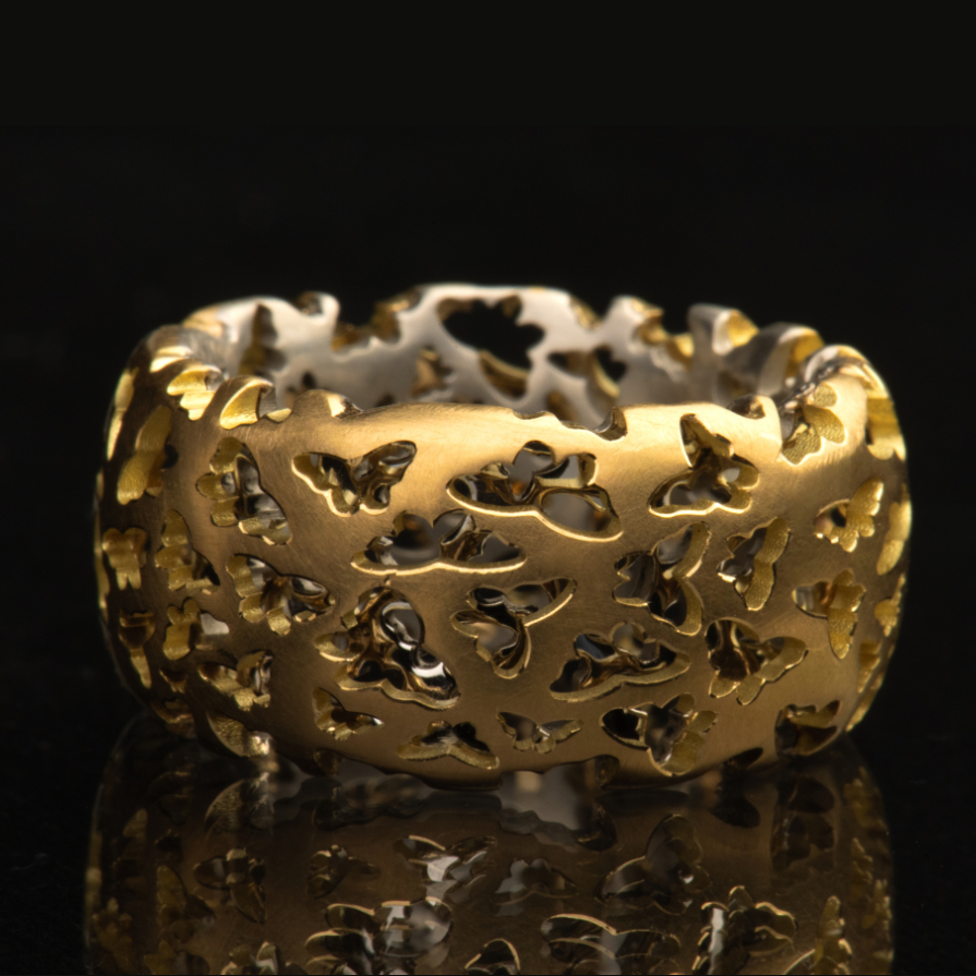 Ausgefallener Ring in 750/-Gelbgold und 950/- Platin - handgefertigt aus dem Galeriehaus Grosche in Castrop-Rauxel, Nähe Duisburg.